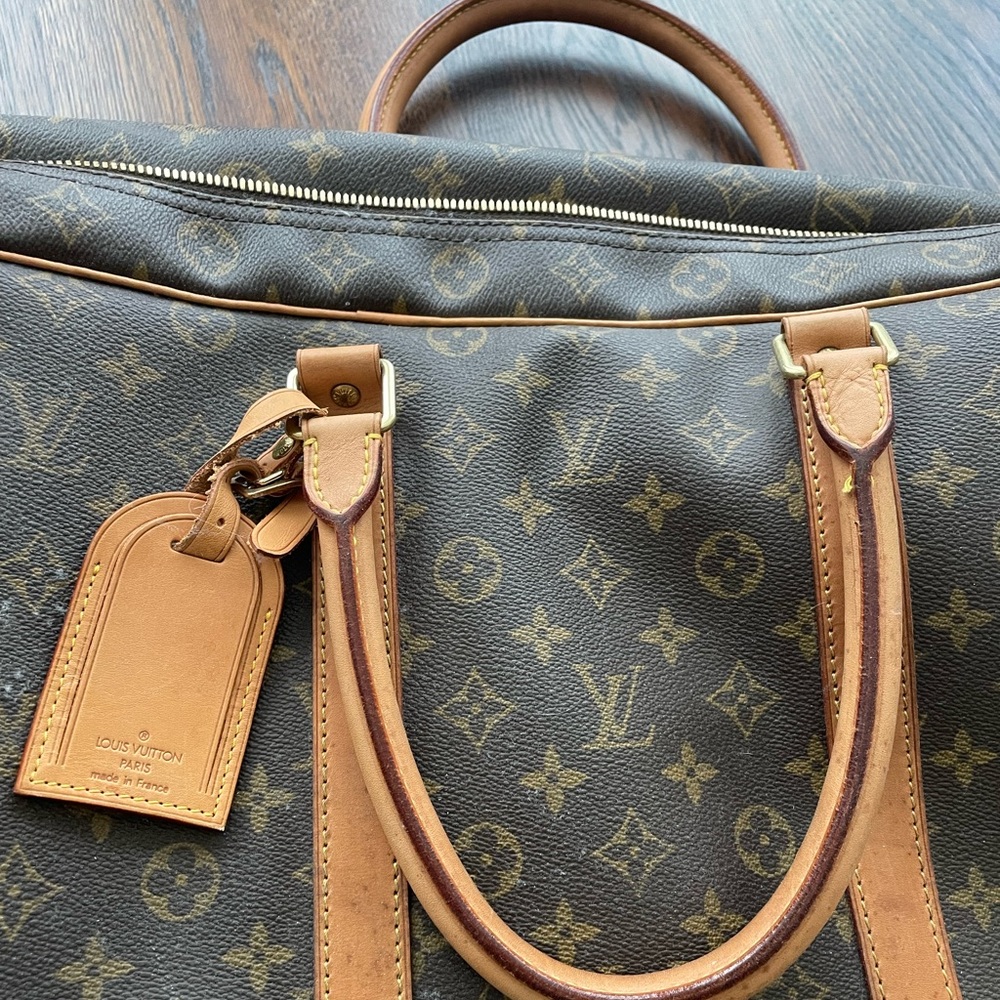 Louis Vuitton monogram print luggage bag